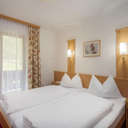Отель Alpenhotel Badmeister Флаттах